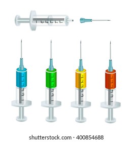 Syringes filled with colored injectable solutions and one empty syringe with disconnected needle.