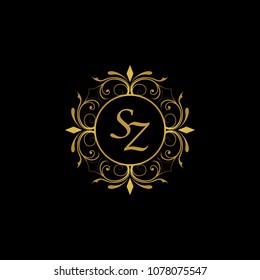 SZ Initial logo. Ornament ampersand monogram golden logo black background