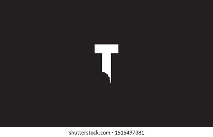 T bite letter logo. Unique attractive creative modern initial T logo with bites shape design