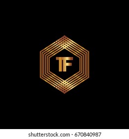 T F Logo