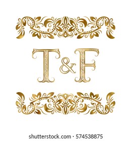 T and F vintage initials logo symbol. The letters are surrounded by ornamental elements. Wedding or business partners monogram in royal style.