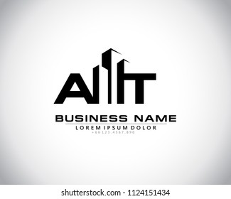 A T Initial logo concept with building template vector.