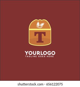 T letter abstract illustration logo. Vector nut, almond, walnut, peanut, pistachio and hazelnut. 