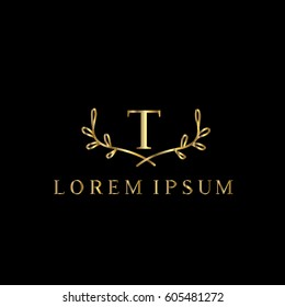 T letter golden branches vector logo design template
