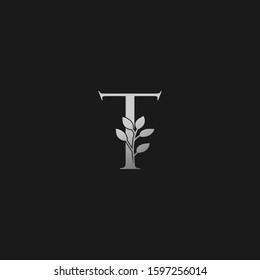 T Letter Logo Silver Classy Vintage  Nature Floral Branch Silhouettes Vector Design Initial Concept.