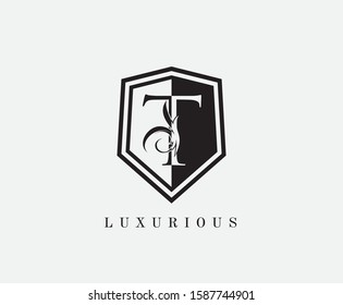 T Letter Shield Letter Logo Icon. Simple T Guard Logo design perfect for fashion, Jewelry, Beauty Salon, Cosmetics, Spa, Hotel and Restaurant Logo. 
