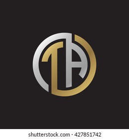 TA initial letters looping linked circle elegant logo golden silver black background