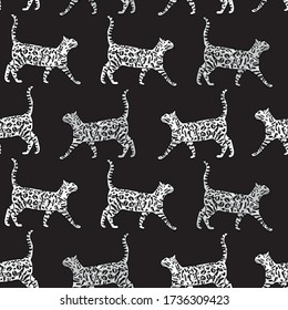 Tabby cats on black background. Vector repeat pattern. Great for home decor, wrapping, fashion, scrapbooking, wallpaper, gift, kids, apparel.