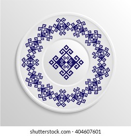 Table appointments in restaurant.. Decorative plate with round ethnic ornament.  Antique pattern.  