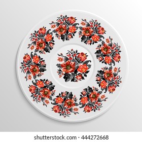 Table appointments in restaurant.. Decorative plate with round ethnic ornament. Ukrainian style. Vintage floral pattern.  Red and black tones.
