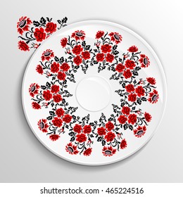 Table appointments in restaurant.. Decorative plate with round ethnic ornament. Ukrainian style.  Roses and sunflowers. Vintage background of napkin. Traditional red
 and black elements.