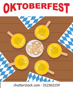 Table and beer mugs. View top. Plate with pretzels, snacks. Oktoberfest. Doily ornament out of  blue. Traditional national food for Festival of ale.