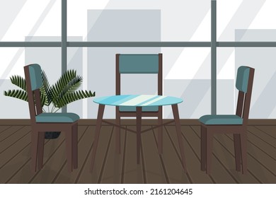 table and chairs in a cafe with windows and a view of the city