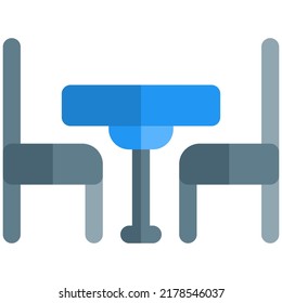 Table and chairs at a restaurant available for booking