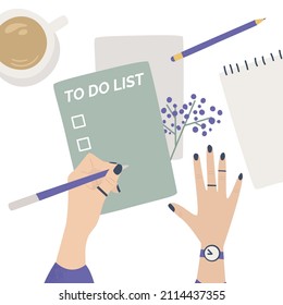 A table with  a cup of coffee on it and a female hand writing plan in a notebook. A comprehensive to-do list with goals and objectives. Colorful vector flat cartoon top view