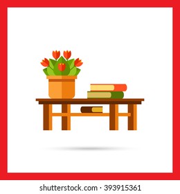Table, flower and books