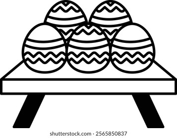 A table with four eggs on it. The eggs are all different sizes and colors. The table is white and the eggs are black