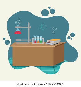 Table with glassware beakers, flasks and books. science chemistry class concept