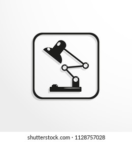 A table lamp with an electric bulb inside. Vector icon.