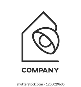 Table lamp and real estate logo