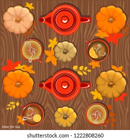 
table with 
red cups of tea and 
red teapot and pumpkins autumn leaves 