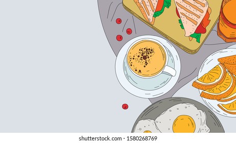 The table is set for Breakfast: coffee, sandwiches, scrambled eggs, orange juice. Handmade pattern.