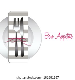 table setting with striped napkin, knife and fork tied with red ribbon on a white  background