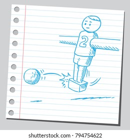 Jugador de fútbol de mesa pateando la pelota