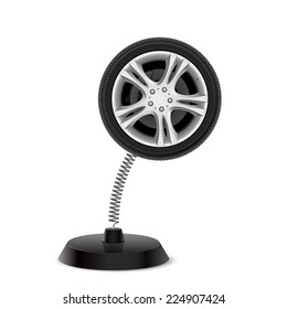 Table souvenir in form of car wheel on spring