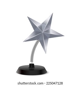 Table souvenir in form of glossy silver star on spring