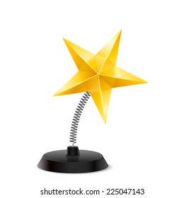 Table souvenir in form of shiny golden star on spring