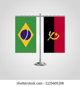 Table stand with flags of Brazil and Angola.Two flag. Flag pole. Symbolizing the cooperation between the two countries. Table flags
