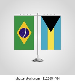 Table stand with flags of Brazil and The Bahamas.Two flag. Flag pole. Symbolizing the cooperation between the two countries. Table flags