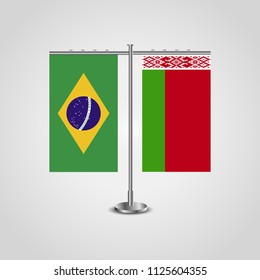 Table stand with flags of Brazil and Belarus.Two flag. Flag pole. Symbolizing the cooperation between the two countries. Table flags