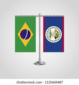 Table stand with flags of Brazil and Belize.Two flag. Flag pole. Symbolizing the cooperation between the two countries. Table flags