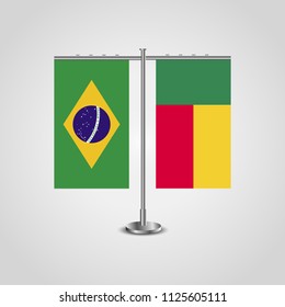Table stand with flags of Brazil and Benin.Two flag. Flag pole. Symbolizing the cooperation between the two countries. Table flags
