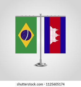 Table stand with flags of Brazil and Cambodia.Two flag. Flag pole. Symbolizing the cooperation between the two countries. Table flags
