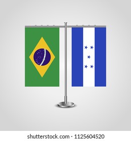 Table stand with flags of Brazil and Honduras.Two flag. Flag pole. Symbolizing the cooperation between the two countries. Table flags
