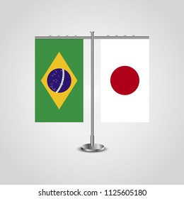 Table stand with flags of Brazil and Japan.Two flag. Flag pole. Symbolizing the cooperation between the two countries. Table flags