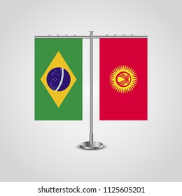 Table stand with flags of Brazil and Kyrgyzstan.Two flag. Flag pole. Symbolizing the cooperation between the two countries. Table flags
