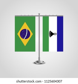 Table stand with flags of Brazil and Lesotho.Two flag. Flag pole. Symbolizing the cooperation between the two countries. Table flags
