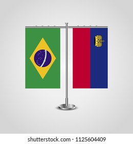 Table stand with flags of Brazil and Liechtenstein.Two flag. Flag pole. Symbolizing the cooperation between the two countries. Table flags
