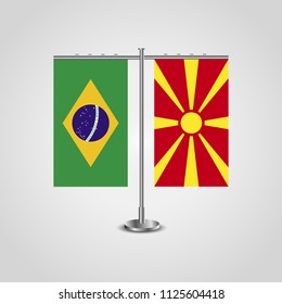 Table stand with flags of Brazil and Macedonia.Two flag. Flag pole. Symbolizing the cooperation between the two countries. Table flags
