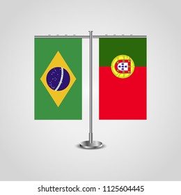 Table stand with flags of Brazil and Portugal.Two flag. Flag pole. Symbolizing the cooperation between the two countries. Table flags
