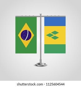 Table stand with flags of Brazil and Saint Vincent and the Grenadines.Two flag. Flag pole. Symbolizing the cooperation between the two countries. Table flags
