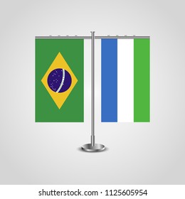 Table stand with flags of Brazil and Sierra Leone.Two flag. Flag pole. Symbolizing the cooperation between the two countries. Table flags
