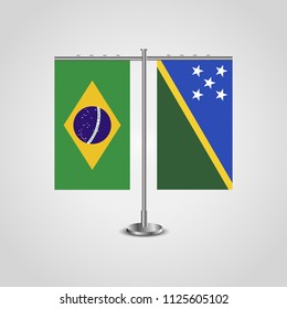 Table stand with flags of Brazil and Solomon islands.Two flag. Flag pole. Symbolizing the cooperation between the two countries. Table flags
