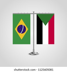 Table stand with flags of Brazil and Sudan.Two flag. Flag pole. Symbolizing the cooperation between the two countries. Table flags