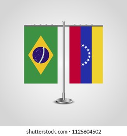 Table stand with flags of Brazil and Venezuela.Two flag. Flag pole. Symbolizing the cooperation between the two countries. Table flags