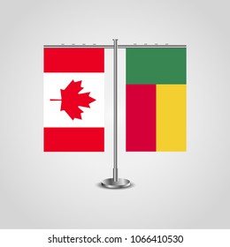 Table stand with flags of Canada and Benin.Two flag. Flag pole. Symbolizing the cooperation between the two countries. Table flags